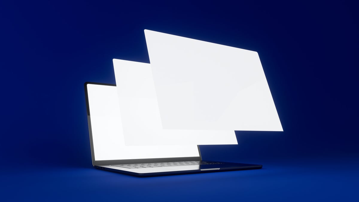 Modern website design showcase on laptop with floating screens